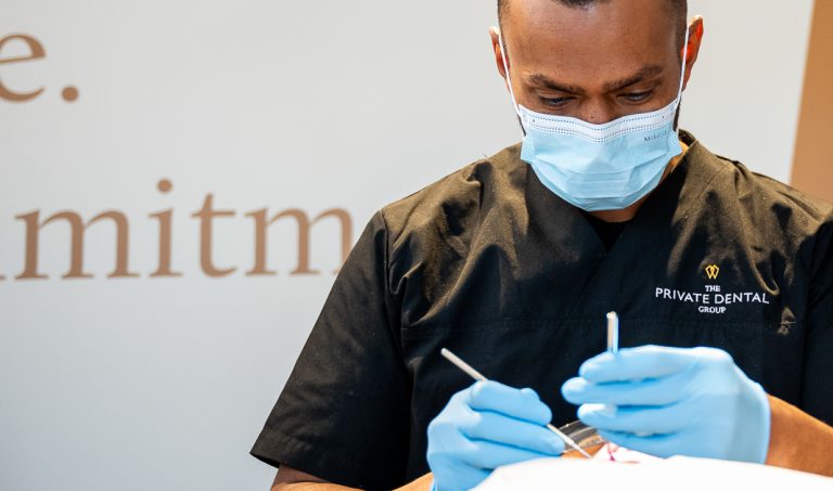 Dentist performing treatment on a patient